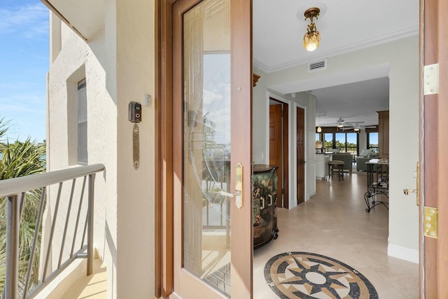 doorway to property with visible vents and a balcony