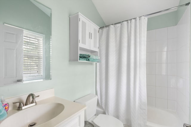 full bathroom featuring vanity, toilet, and shower / bath combo