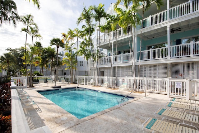 view of swimming pool with a patio