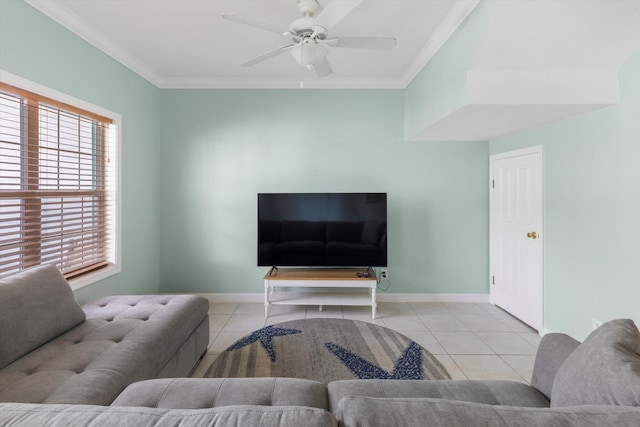 tiled living room featuring ornamental molding and ceiling fan