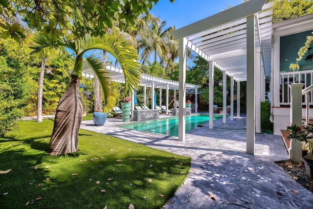 exterior space featuring an outdoor pool and a pergola