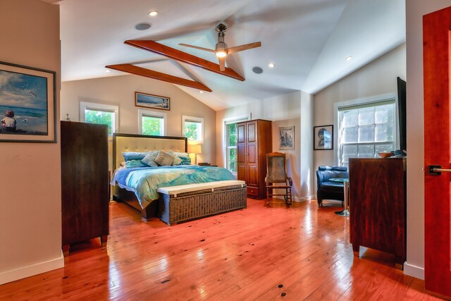 bedroom with recessed lighting, wood-type flooring, lofted ceiling with beams, and baseboards