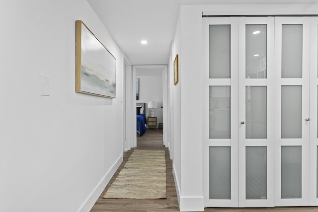 hall featuring dark wood-type flooring