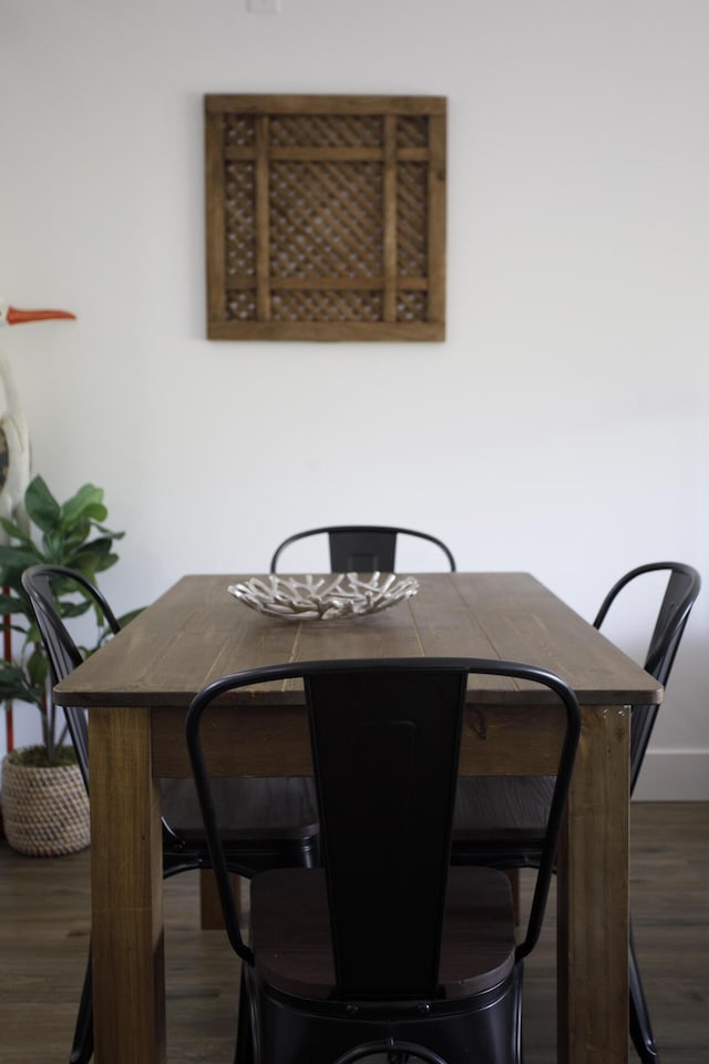 dining room featuring dark hardwood / wood-style flooring