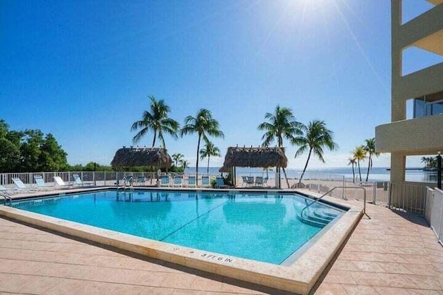 view of swimming pool with a gazebo and a patio