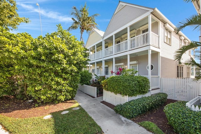 view of front of home with a balcony