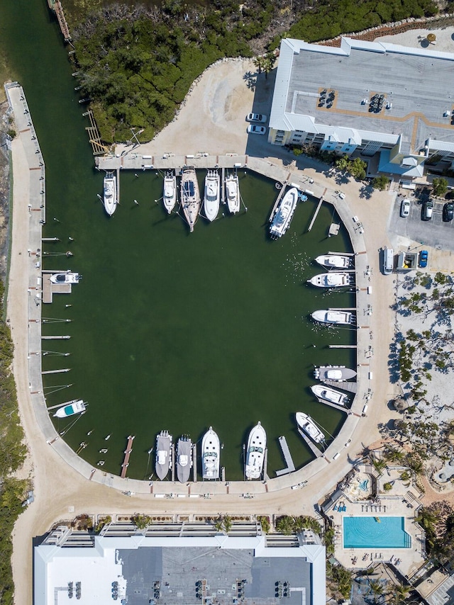 birds eye view of property featuring a water view