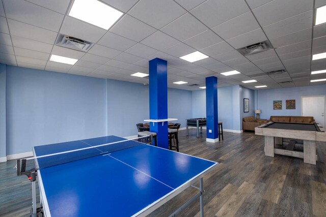 game room featuring visible vents, baseboards, and wood finished floors