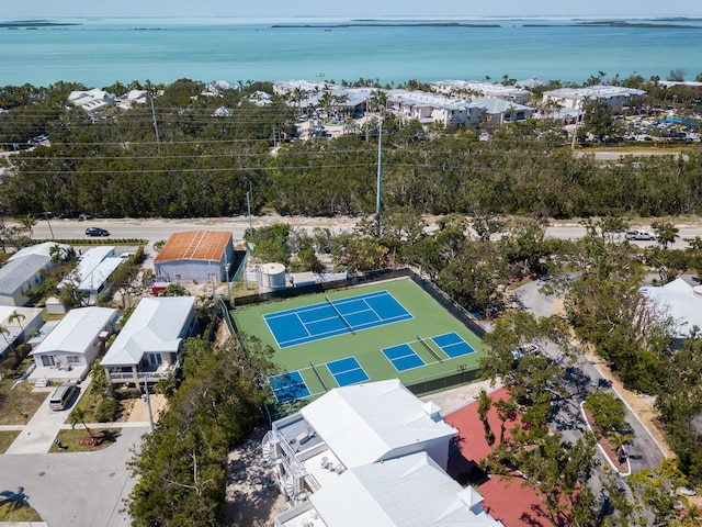 bird's eye view featuring a residential view and a water view