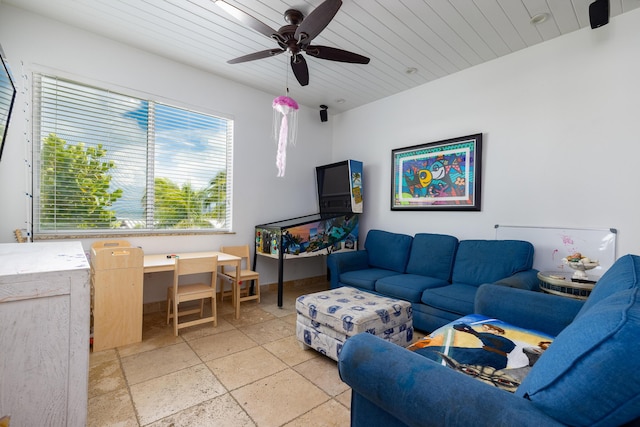 107 Hilson Ct, Tavernier, FL 33070 - living area featuring stone tile floors, a ceiling fan, and wood ceiling