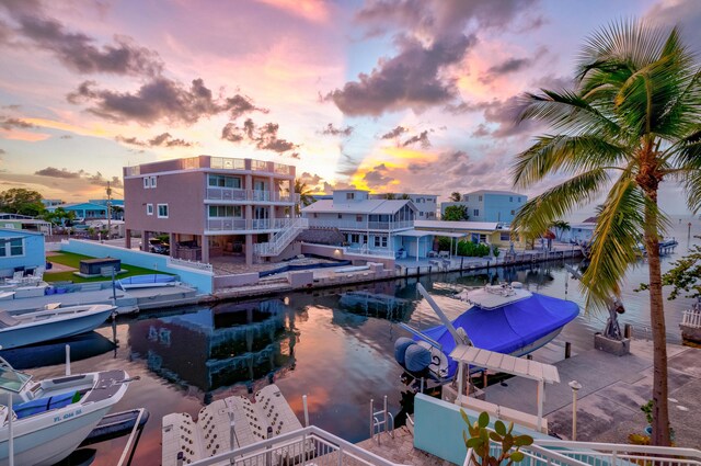 107 Hilson Ct, Tavernier, FL 33070 - exterior space featuring a water view and boat lift
