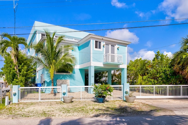 107 Hilson Ct, Tavernier, FL 33070 - coastal home with a fenced front yard and a balcony