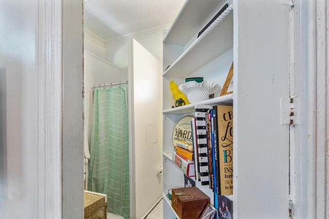 901 Eisenhower Dr, Key West, FL 33040 - bathroom featuring crown molding and a shower with shower curtain