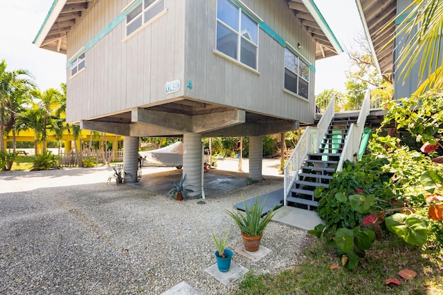 back of property with stairway