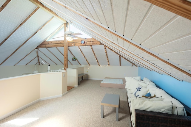 additional living space featuring baseboards, carpet flooring, and vaulted ceiling