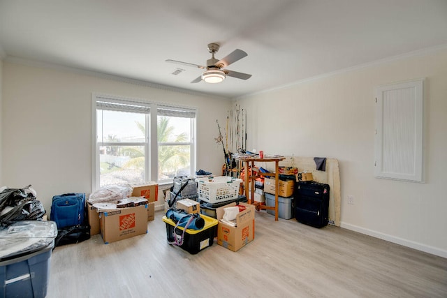 storage with a ceiling fan and visible vents