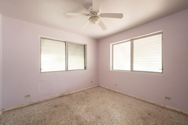 spare room featuring ceiling fan