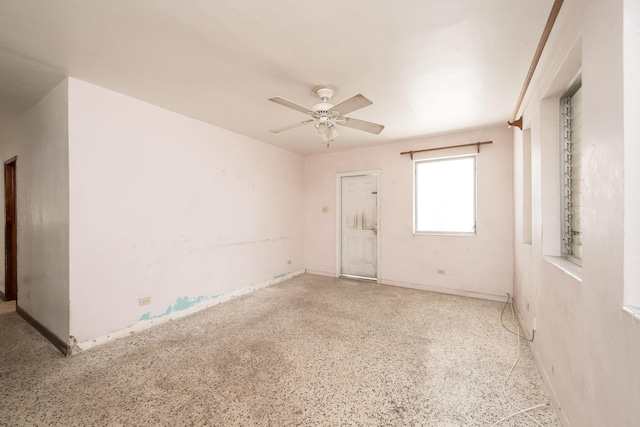 spare room featuring ceiling fan