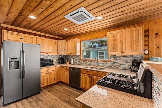 kitchen featuring sink, decorative backsplash, black appliances, wooden ceiling, and light wood-type flooring