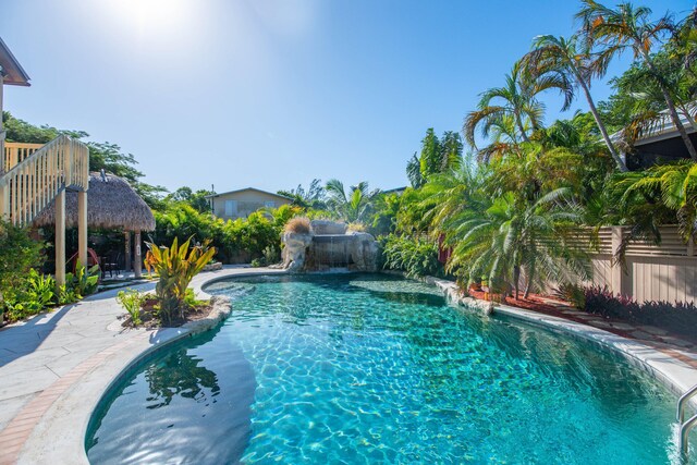 view of pool featuring a gazebo and pool water feature