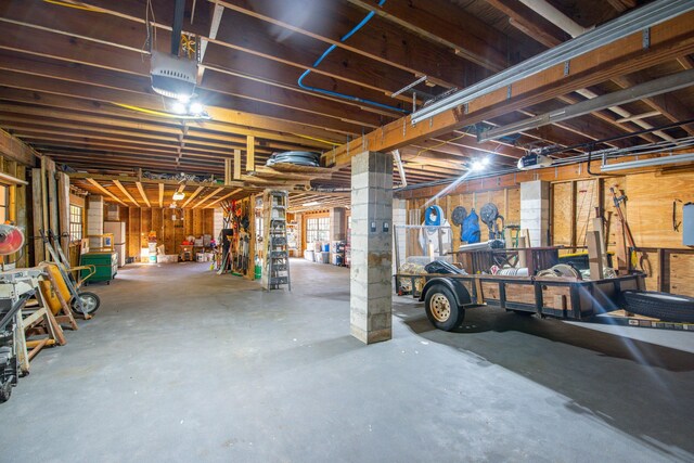 basement featuring white fridge