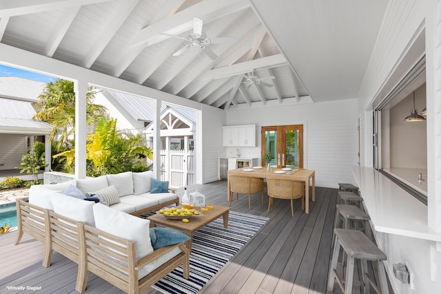 wooden deck with ceiling fan, outdoor dining area, and outdoor lounge area