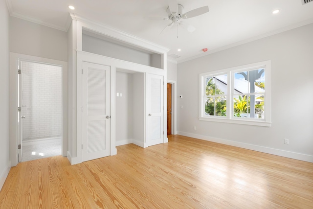 unfurnished bedroom with baseboards, ensuite bath, crown molding, light wood-type flooring, and recessed lighting