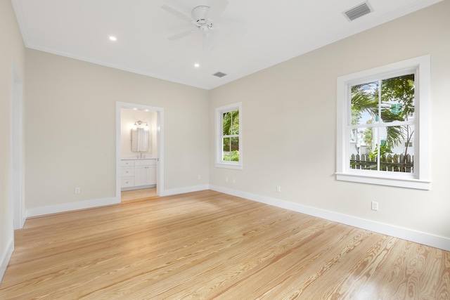 unfurnished bedroom with baseboards, visible vents, and light wood finished floors