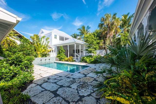 pool featuring a patio area