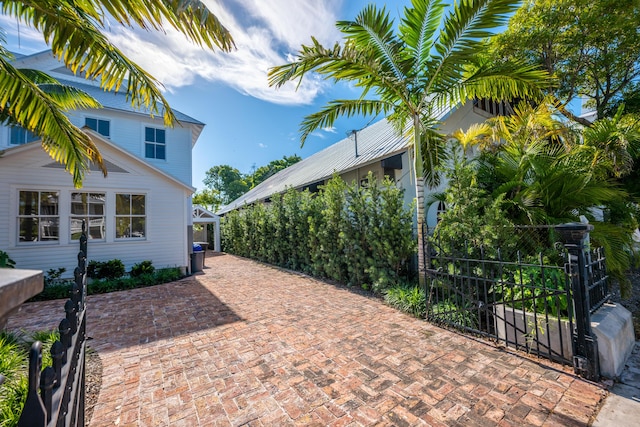 exterior space featuring a gate and fence