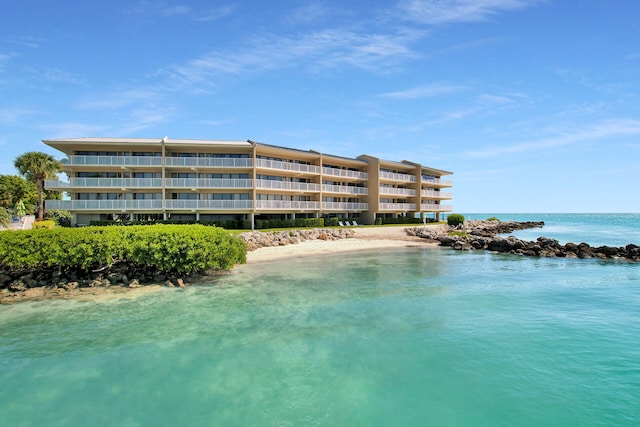 property view of water featuring a beach view