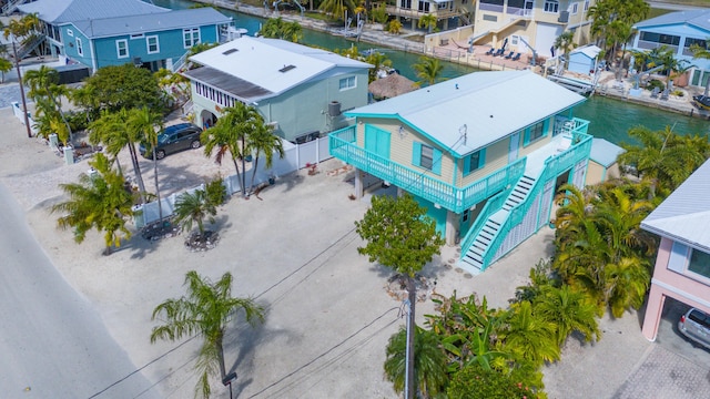 aerial view featuring a water view and a residential view