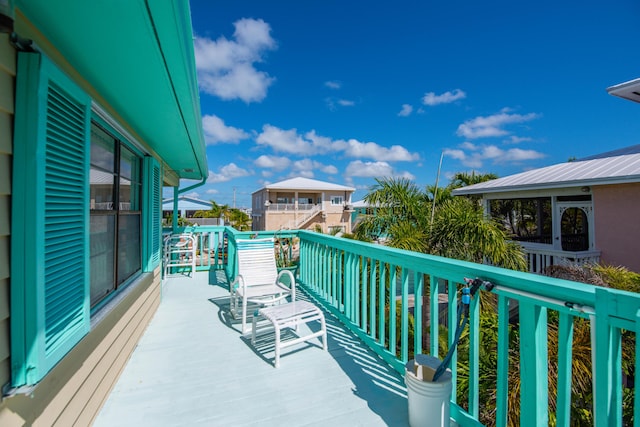 view of wooden balcony with a deck