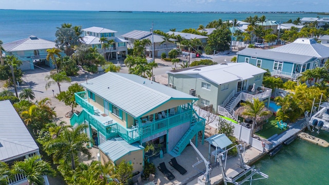 aerial view featuring a water view and a residential view