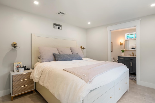 125 Harbor Dr, Key Largo, FL 33037 - bedroom featuring recessed lighting, connected bathroom, and light tile patterned flooring