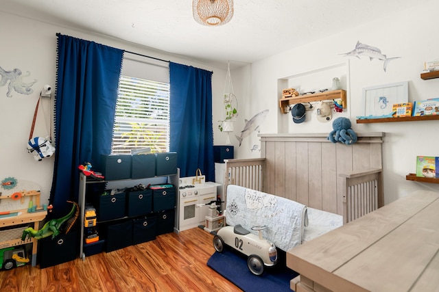 125 Harbor Dr, Key Largo, FL 33037 - bedroom featuring wood finished floors