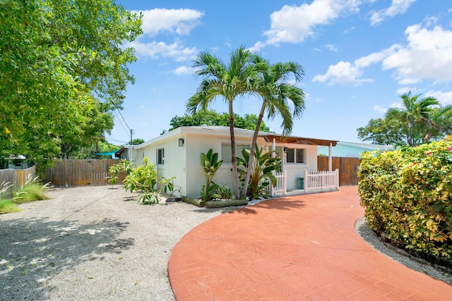 125 Harbor Dr, Key Largo, FL 33037 - view of front facade with stucco siding