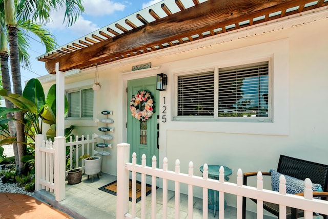 125 Harbor Dr, Key Largo, FL 33037 - view of exterior entry with stucco siding