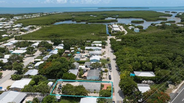 125 Harbor Dr, Key Largo, FL 33037 - aerial perspective of suburban area with a nearby body of water and property boundaries highlighted