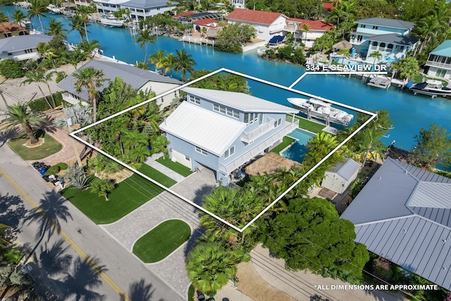 aerial view featuring a residential view and a water view