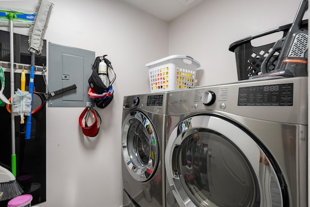 laundry room featuring washer and clothes dryer