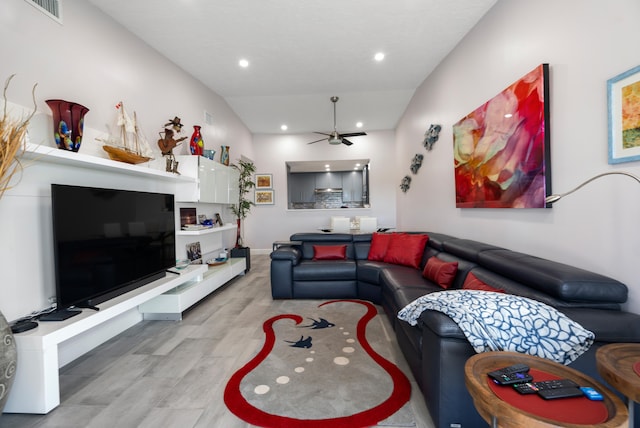 living room with light wood-type flooring and ceiling fan