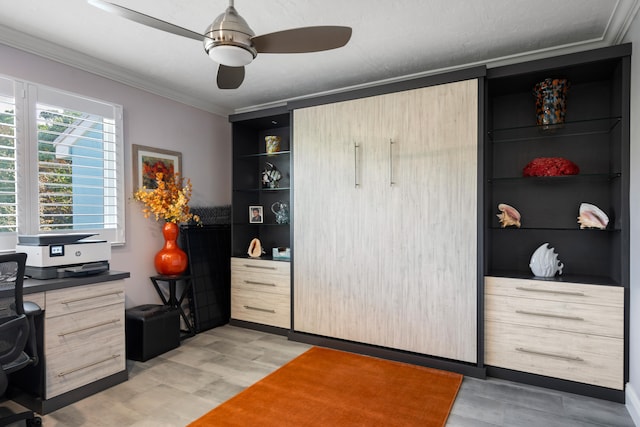 office featuring built in shelves, ornamental molding, light hardwood / wood-style floors, and ceiling fan