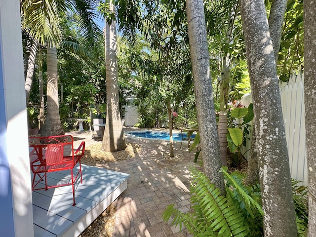 820 Carsten Ln, Key West, FL 33040 - fenced backyard with an outdoor pool and a patio
