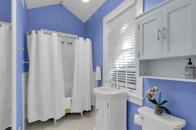 820 Carsten Ln, Key West, FL 33040 - full bathroom featuring a shower with shower curtain, vanity, vaulted ceiling, and tile patterned flooring