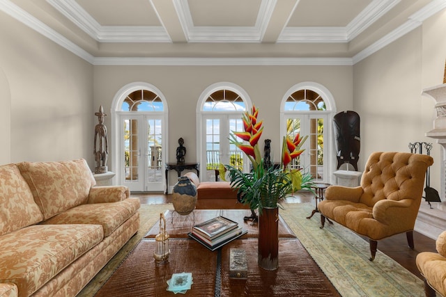 69 Cannon Royal Dr, Shark Key, FL 33040 - living room featuring wood finished floors, a fireplace, french doors, a towering ceiling, and beamed ceiling