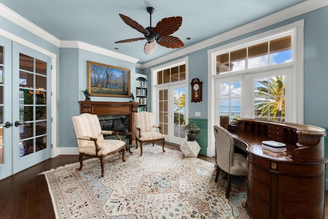 69 Cannon Royal Dr, Shark Key, FL 33040 - sitting room with french doors, crown molding, ceiling fan, and hardwood / wood-style floors