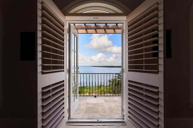 69 Cannon Royal Dr, Shark Key, FL 33040 - doorway to outside featuring a water view