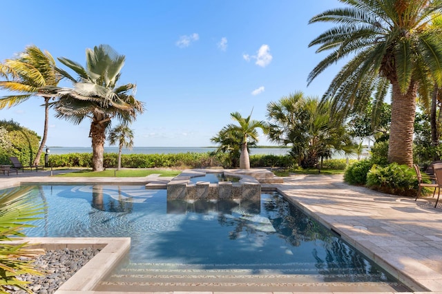 69 Cannon Royal Dr, Shark Key, FL 33040 - view of swimming pool with a pool with connected hot tub