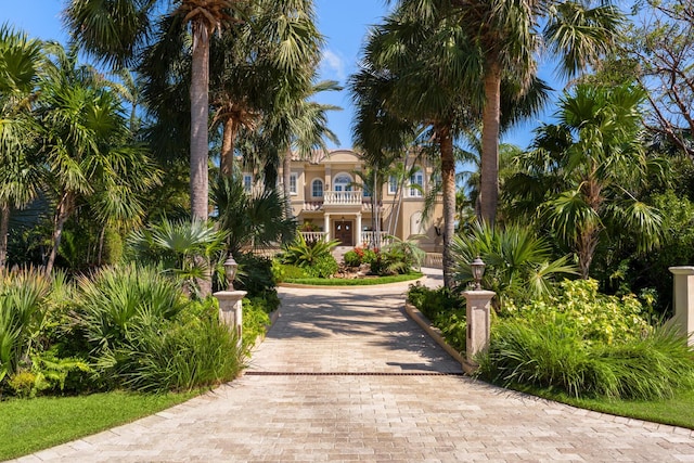 69 Cannon Royal Dr, Shark Key, FL 33040 - view of front of house with a balcony and decorative driveway